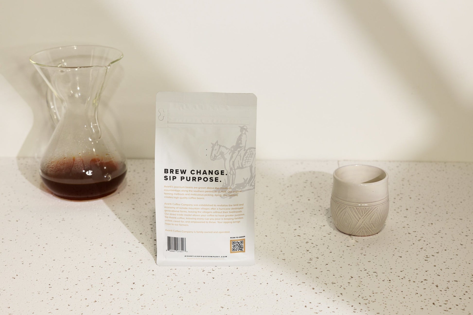 Medium roast coffee by Avanti Coffee Company, showcasing a bag of Ayiti-Medium Roast coffee beans.