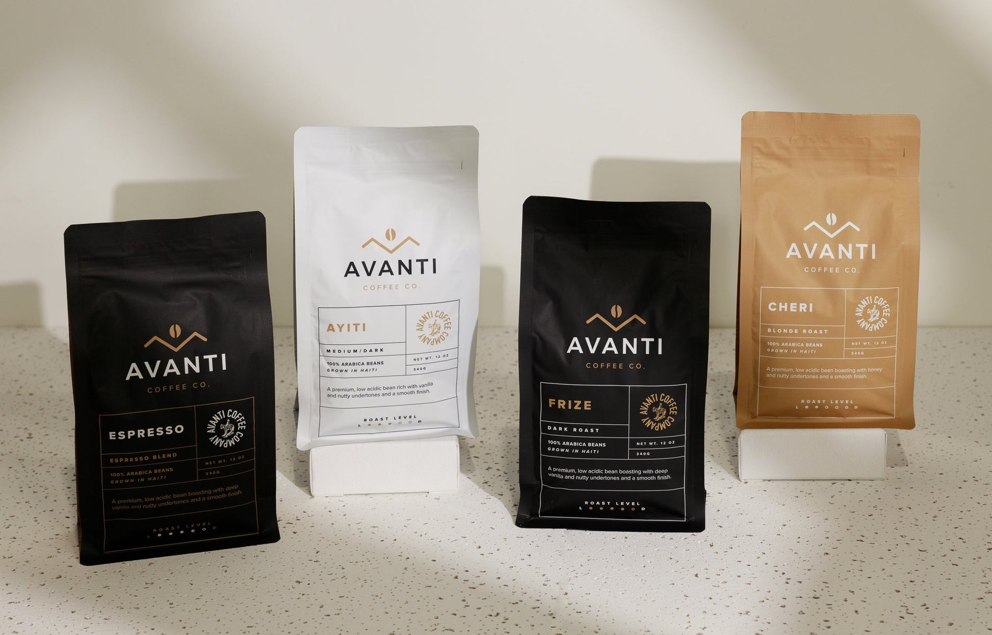 Assorted Avanti Coffee Company coffee beans and accessories in the Ultimate Coffee Lover Gift Set, perfect for coffee enthusiasts.