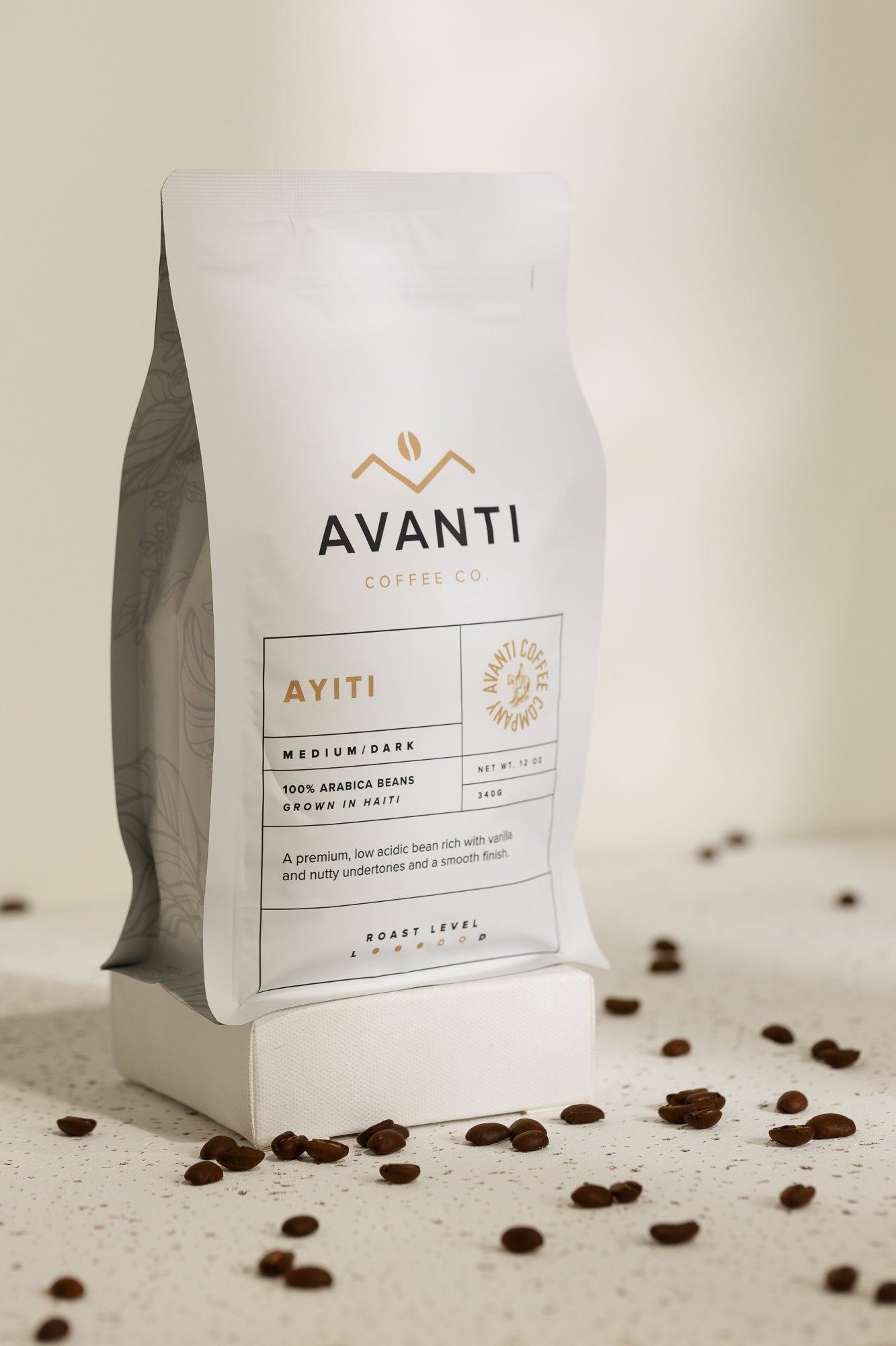 Medium roast coffee bag from Avanti Coffee Company featuring Ayiti blend, with a rich aroma and bold flavor profile.