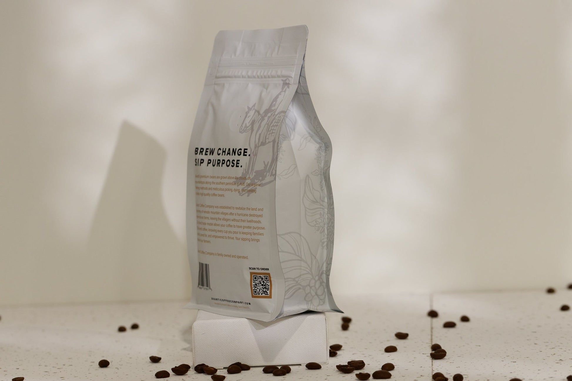 Medium roast coffee by Avanti Coffee Company featuring a bag of Ayiti Coffee, rich and aromatic beans for brewing.