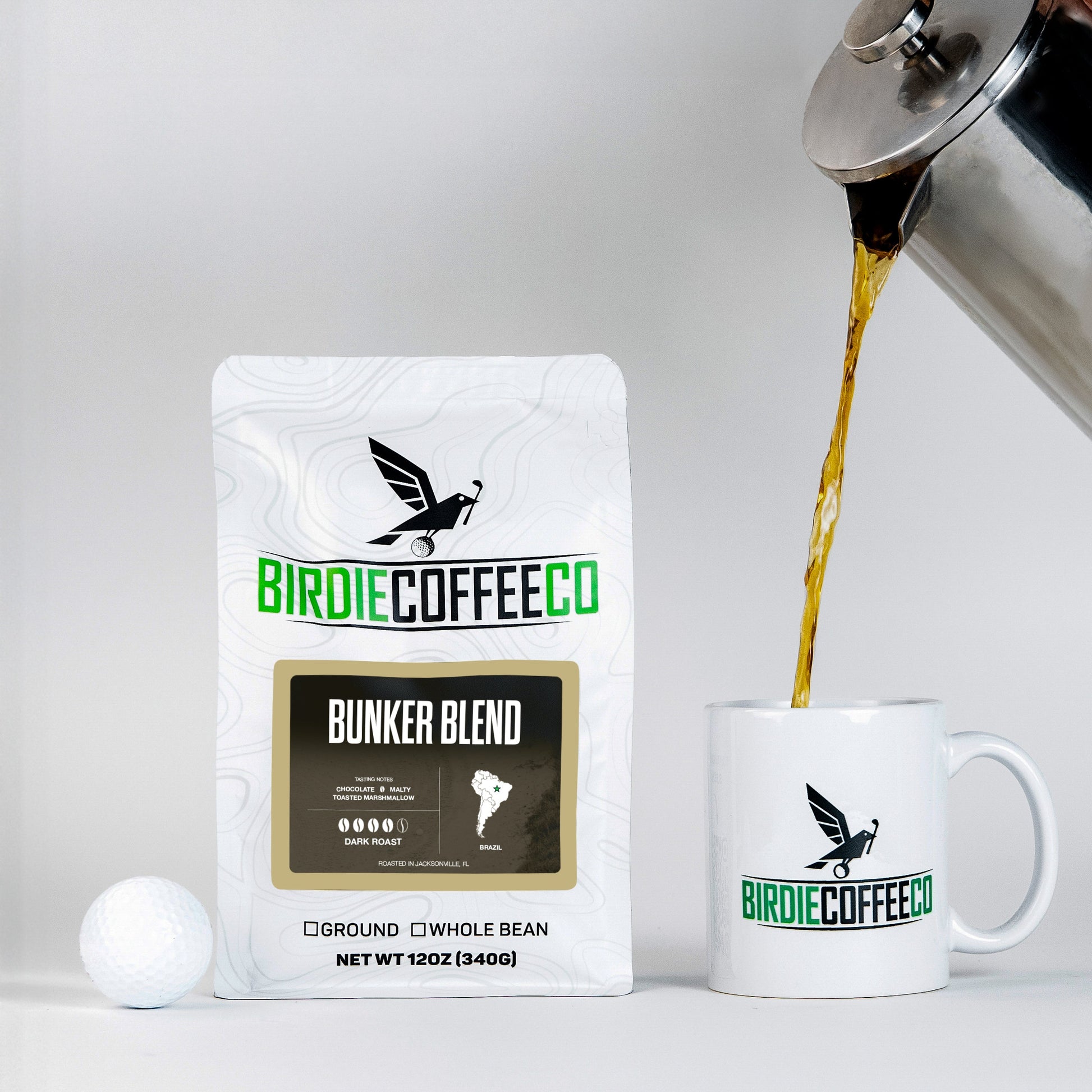 A cup of Birdie Coffee Company's Bunker Blend Latin American coffee with a rich aroma and a smooth, inviting appearance.