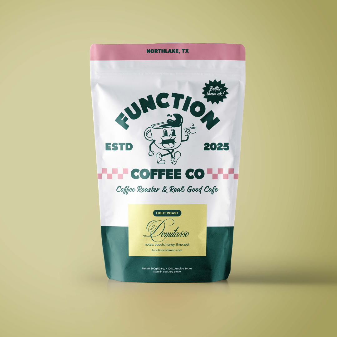 Light Roast Demitasse coffee beans from Function Coffee Co, showcasing a small bag of premium coffee for espresso or small brews.