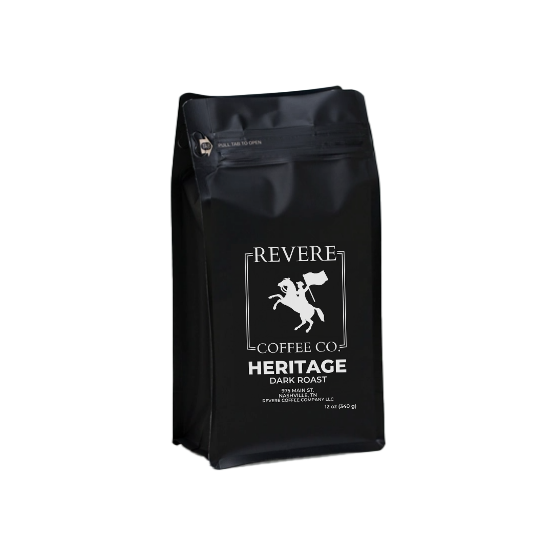 Revere Coffee Company's Heritage Dark Roast coffee bag with branding and dark roast label visible.