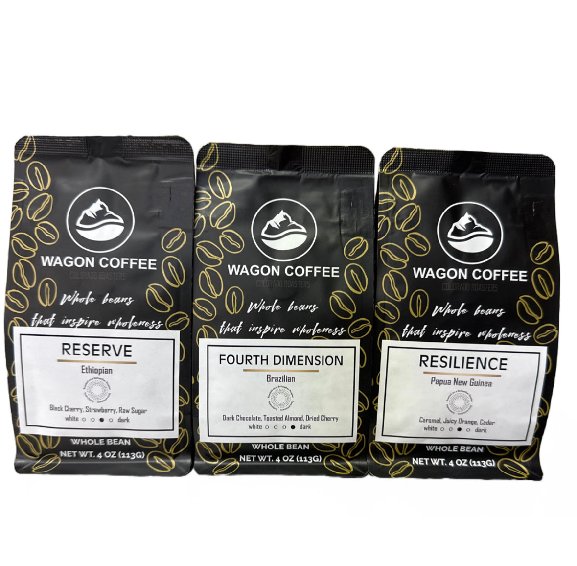 Assorted coffee cups and tasting spoons on a tray, showcasing Wagon Coffee's Coffee Tasting World Tour Sampler for global coffee flavors.