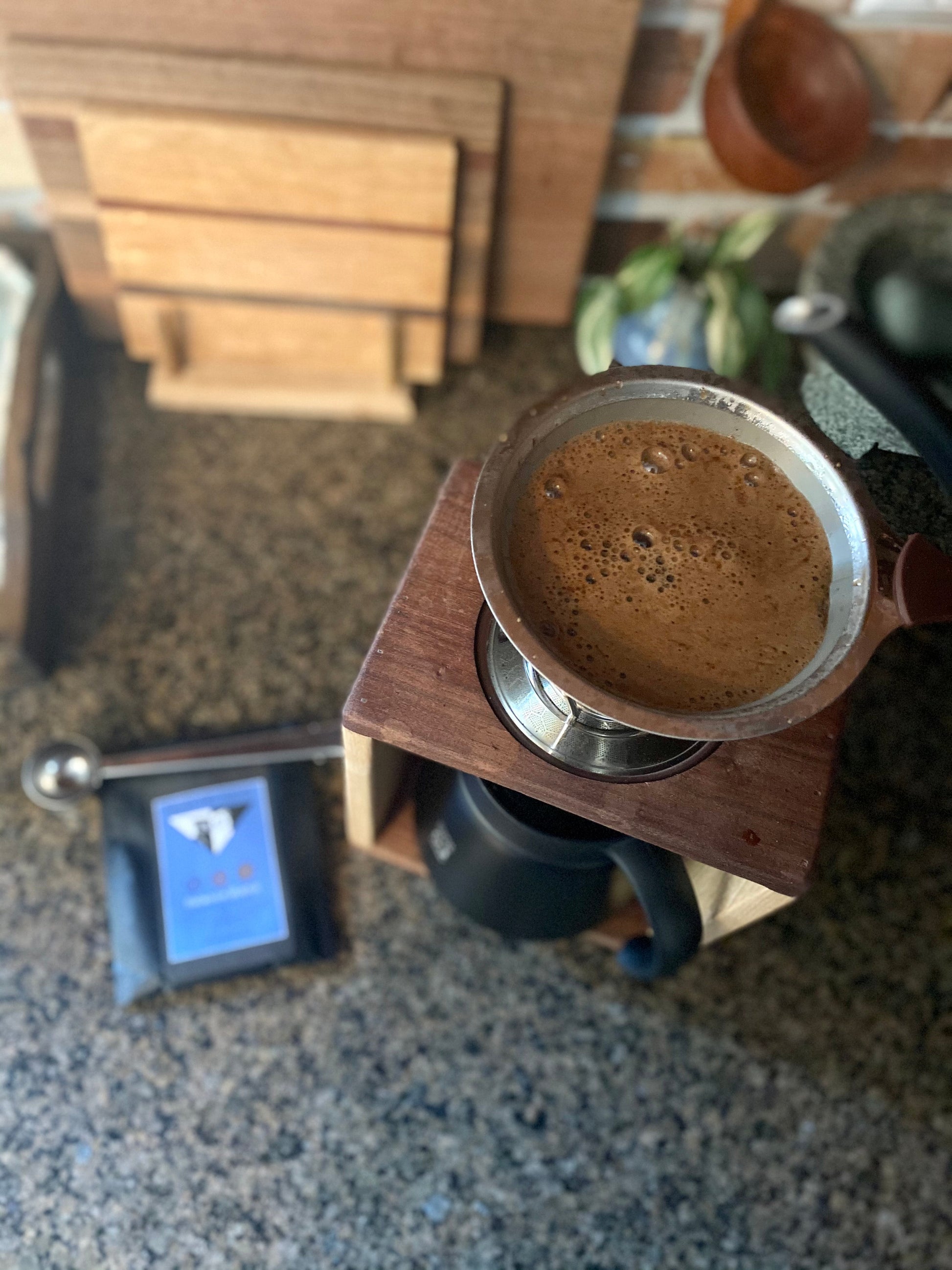 Smart Owl Coffee Balance Blend Vietnamese Lavender Coffee in a brewed cup with lavender flowers and coffee beans.