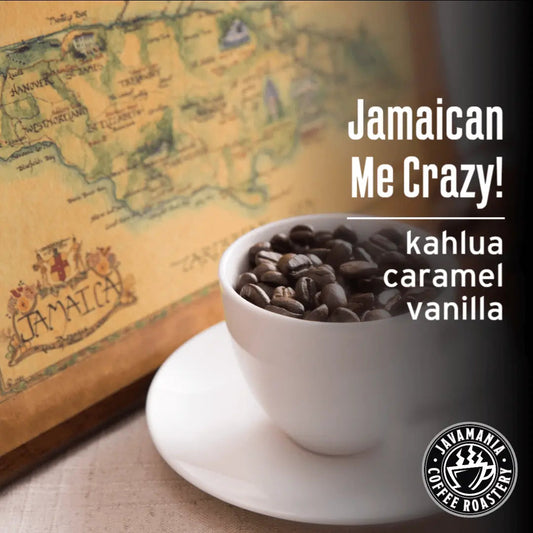 JavaMania Jamaican Me Crazy flavored coffee cup showing vibrant packaging and steaming hot coffee inside.