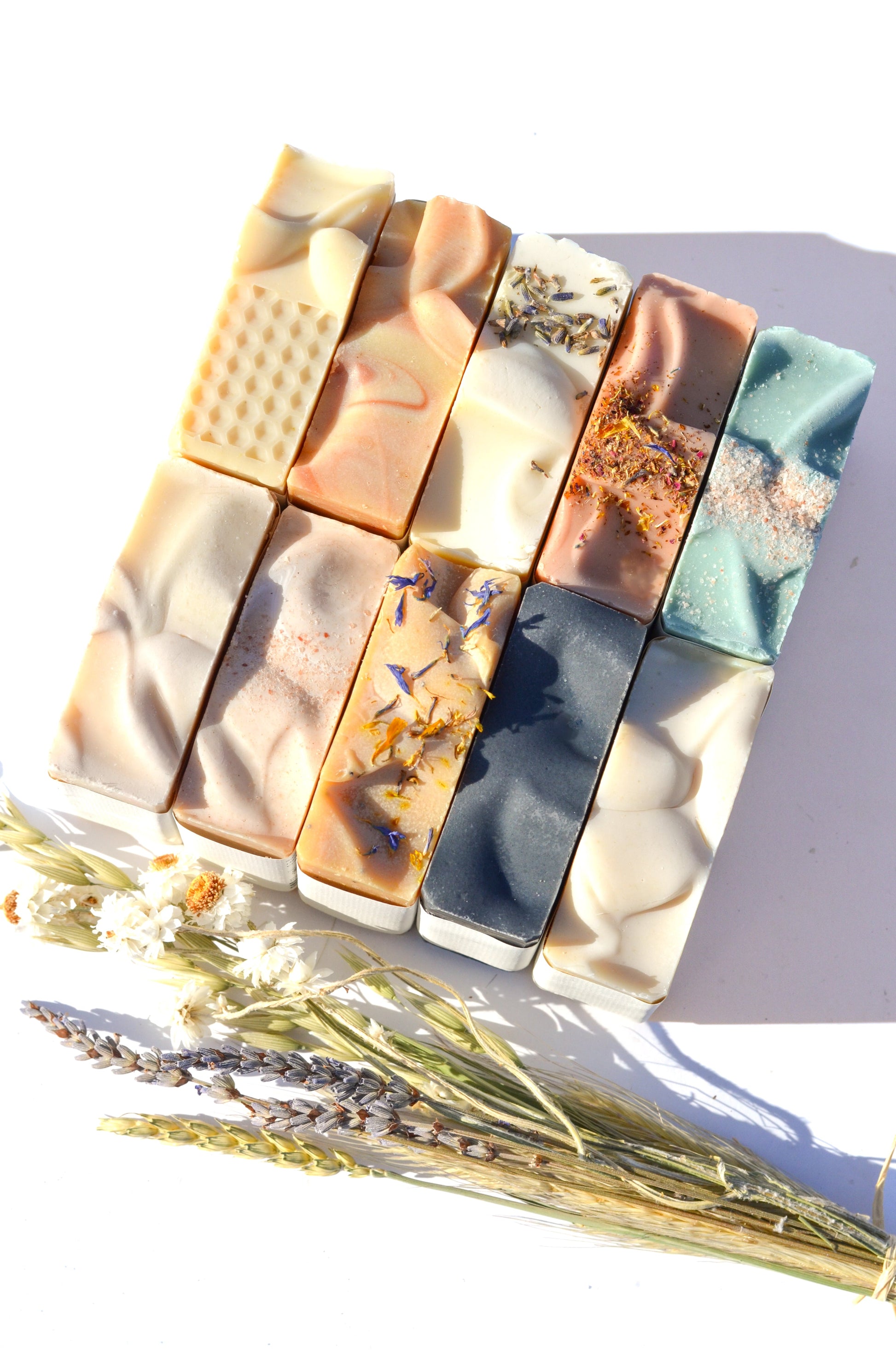 Luxurious farmhouse artisan soap collection by Pretty Farm Girl featuring goat milk and tallow soaps in elegant packaging