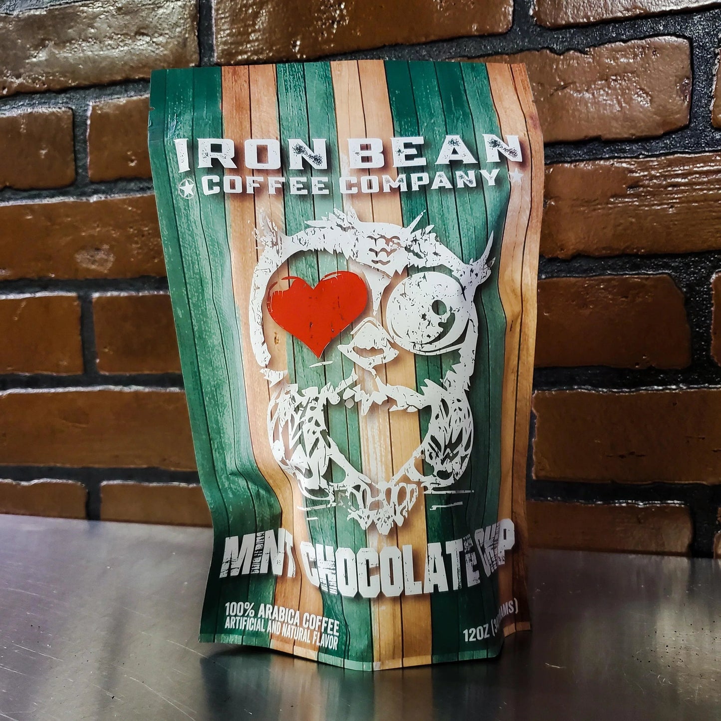 Iron Bean Coffee Company Mint Chocolate Chip coffee bag, 12oz, featuring mint and chocolate flavor branding.