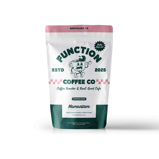 Ground and whole coffee beans of Function Coffee Co's Espresso Blend Momentum, rich, dark roasted coffee for espresso brewing.