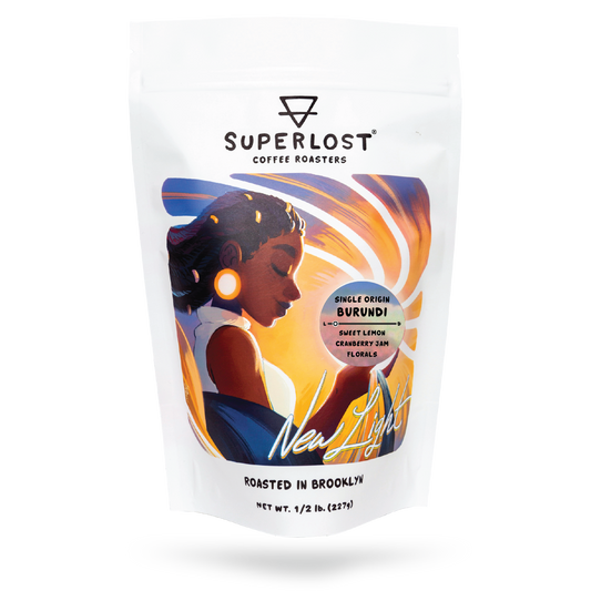 Freshly brewed Burundi coffee from Superlost Coffee in a clear glass cup, showcasing its rich, aromatic brew.