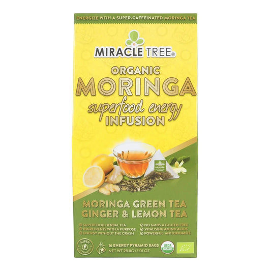 Organic Moringa Energy Tea by Miracle Tree featuring ginger and lemon in a tea bag with fresh lemon slices and ginger root.