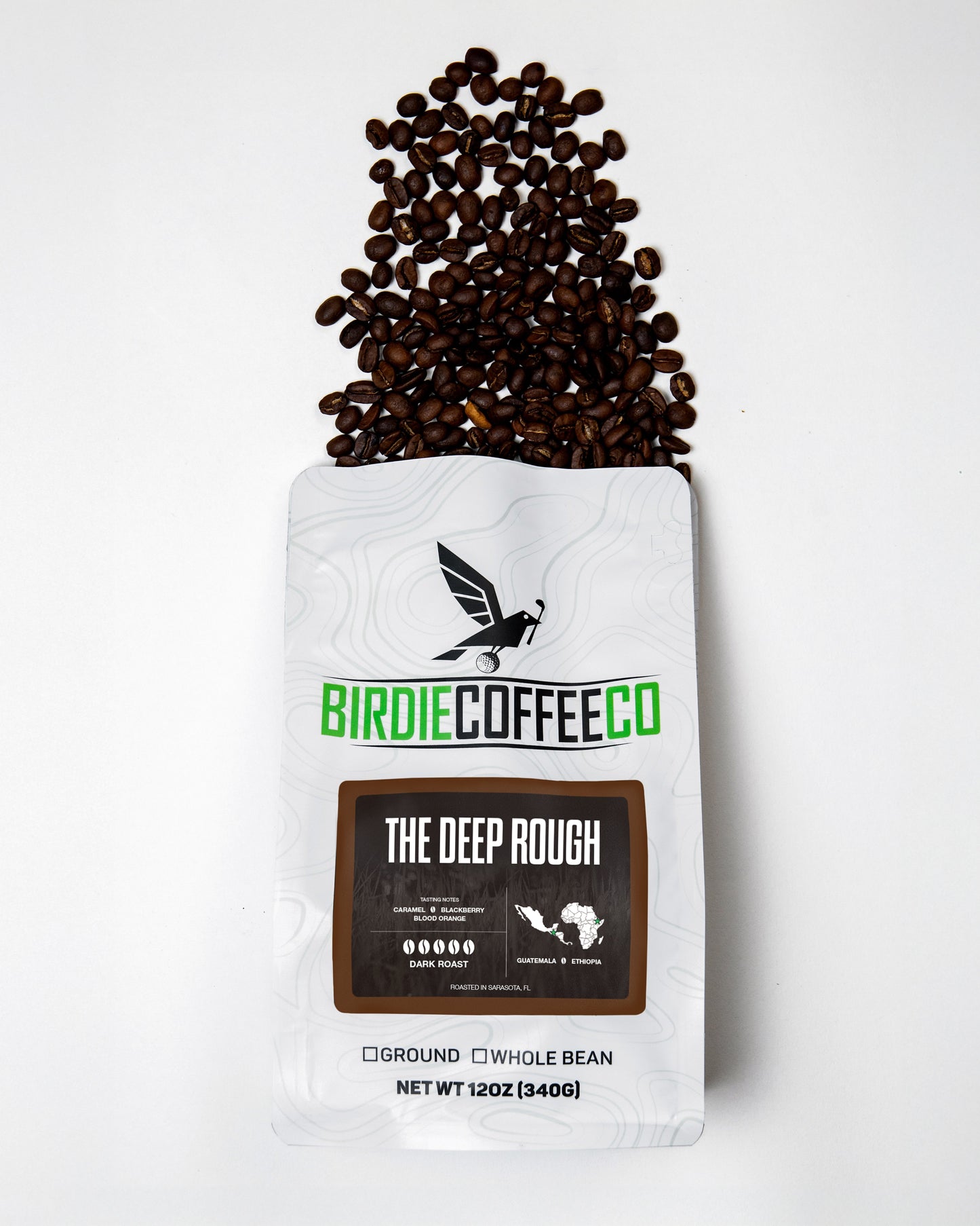 Dark roast coffee bag from Birdie Coffee Company, featuring The Deep Rough blend with rich, bold coffee beans.