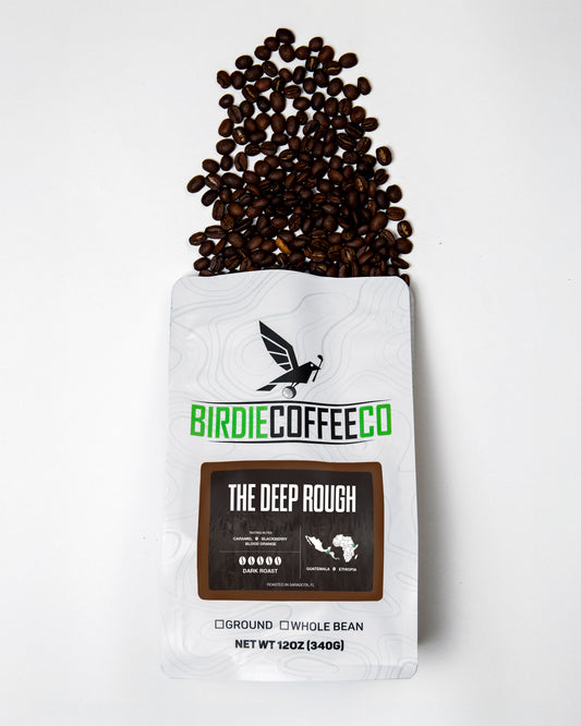 Dark roast coffee bag from Birdie Coffee Company, featuring The Deep Rough blend with rich, bold coffee beans.